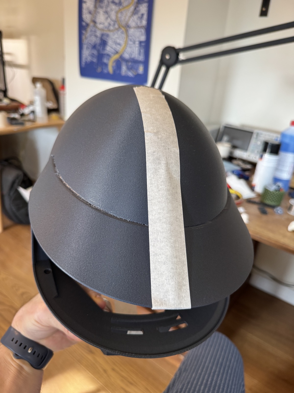 Bonding the dome sections — masking tape holding the seam while the acetone weld cures