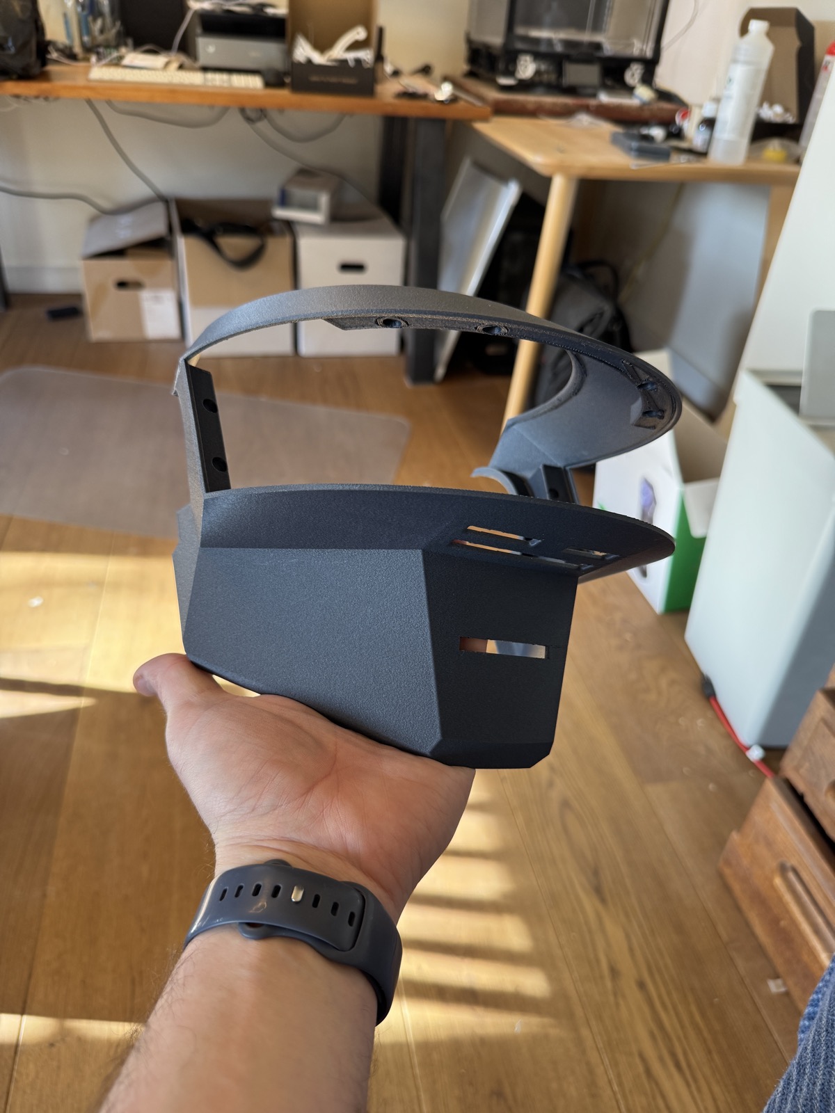 The mask and visor opening from the front