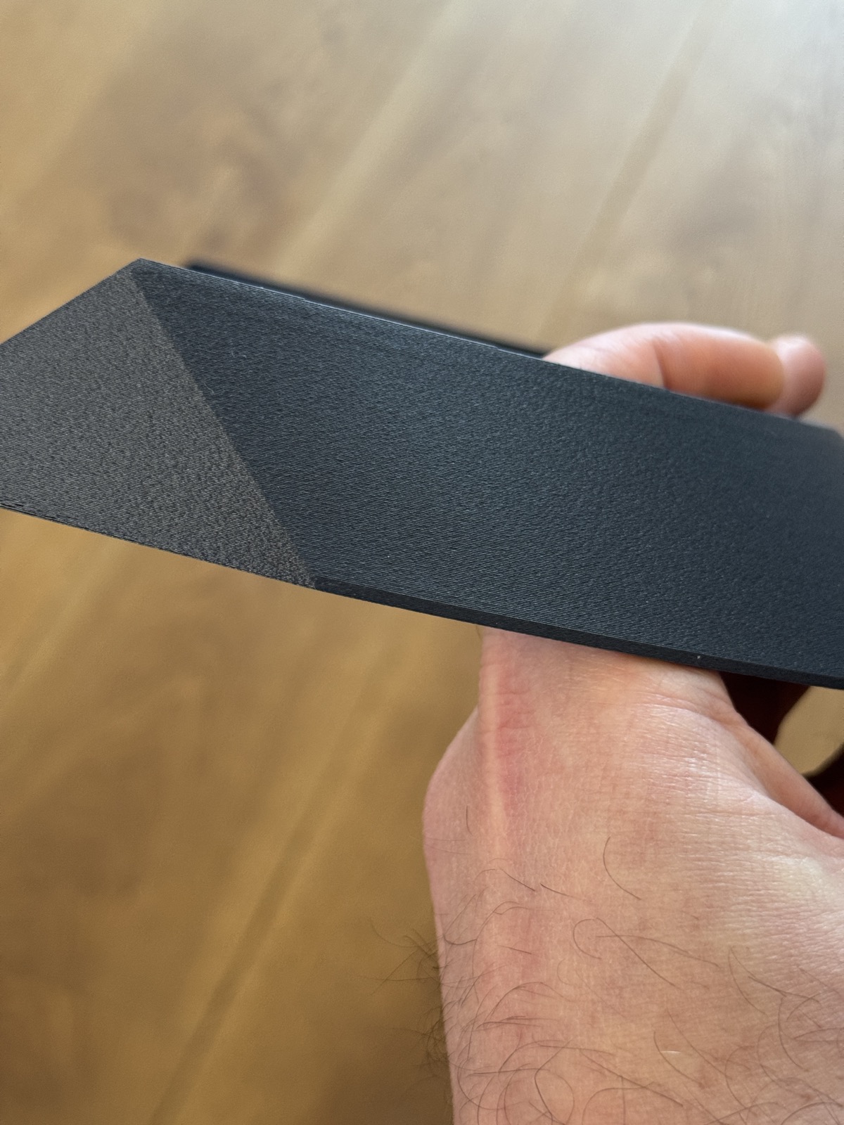 Close-up of the ASA CF08 surface texture, with one section partially smoothed by acetone