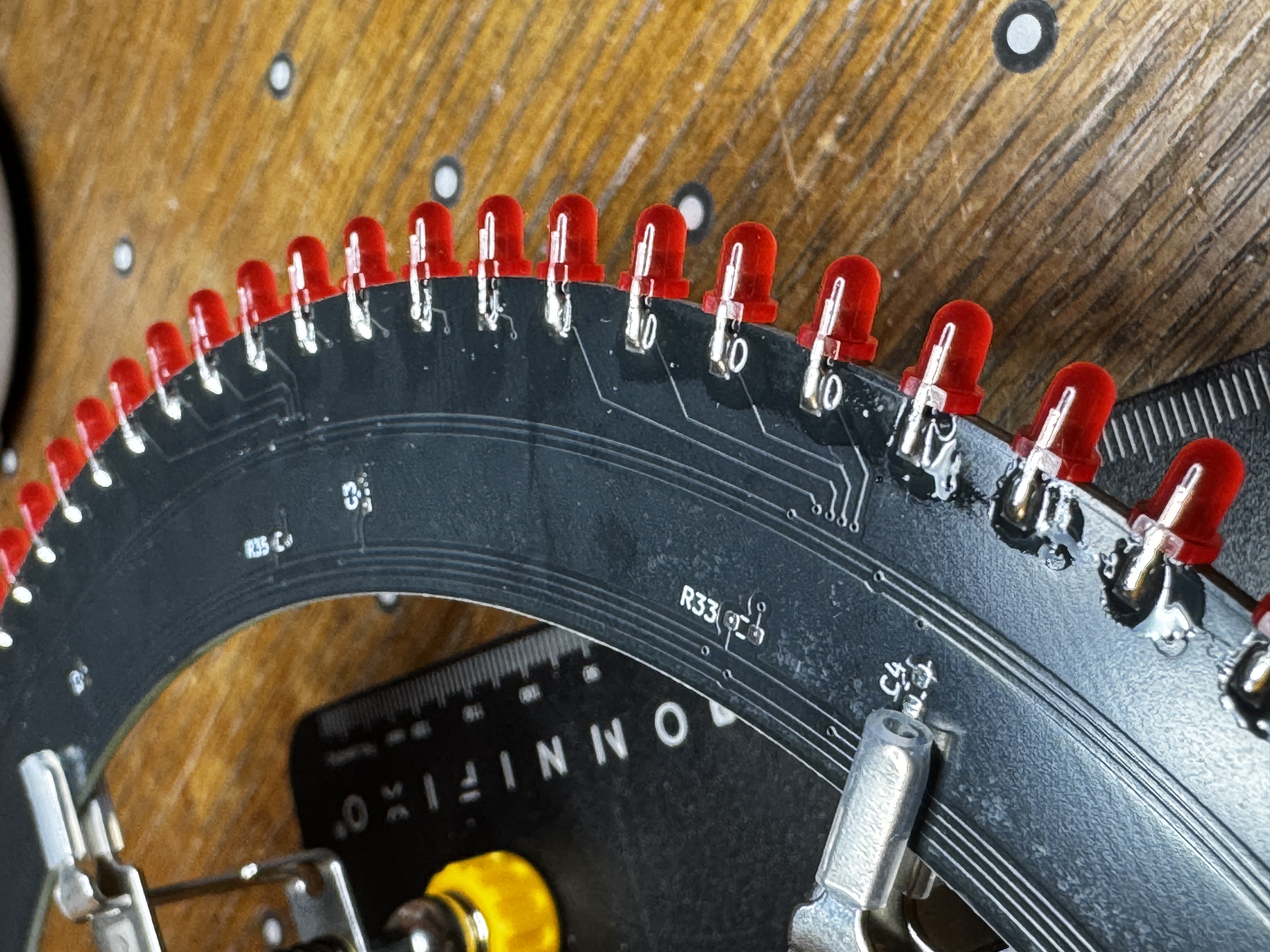 Closeup of a finished board showing the SMD components and edge-mounted LEDs